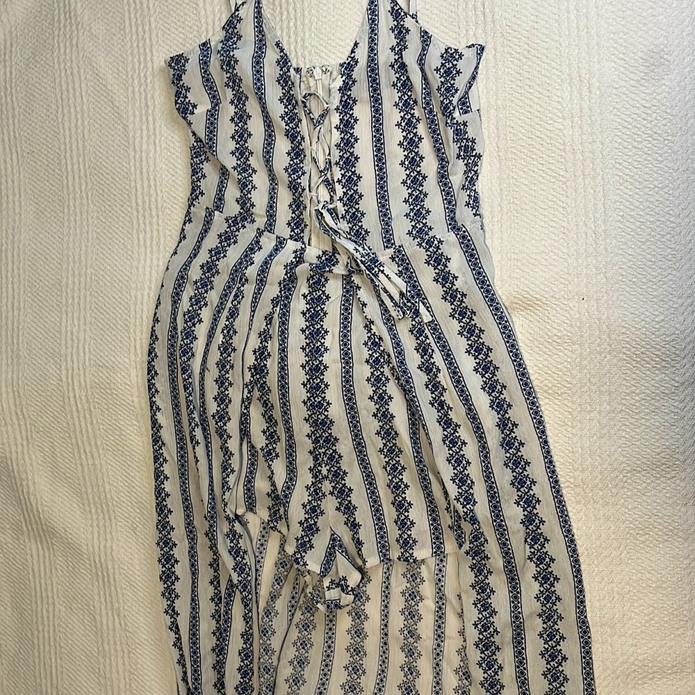 Small Romper, opens up in the front and then goes full length